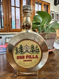 bottiglia brandy oro Pilla 