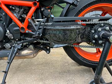 Cover monobraccio in carbonoio