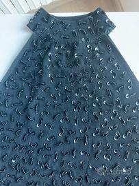 Maglia nera smanicata con perline e paillettes
