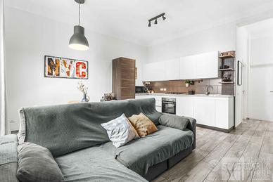 Divano letto Ikea angolare grigio con contenitore