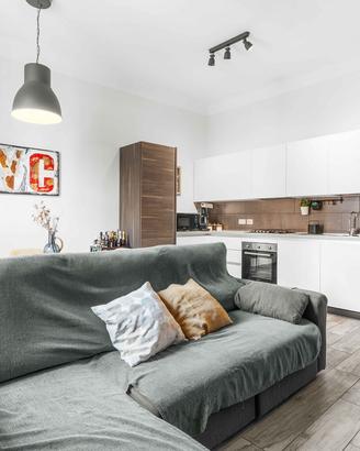 Divano letto Ikea angolare grigio con contenitore