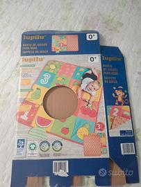 Tappeto e giochi neonato