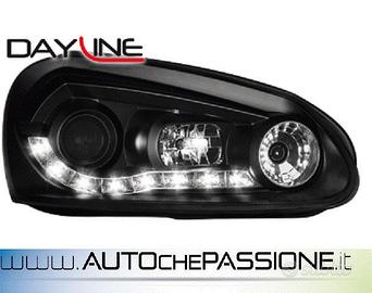 Coppia fanali anteriori DAYLINE neri per VW GOLF 5