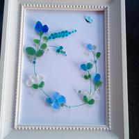 Quadretto  con vetrini di mare 