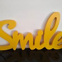 Scritta smile gialla