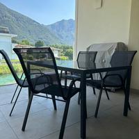 Tavolo grande in metallo e vetro + 4 sedie