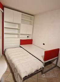 Camera da letto salvaspazio bianca