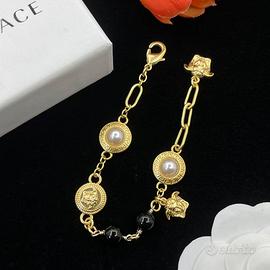 Bracciale dorato versace
