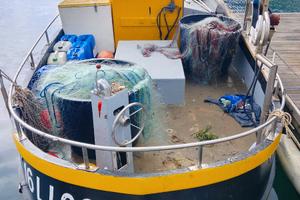 Barca da pesca con licenza