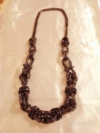 Collana in metallo intrecciato a nodi color bronzo