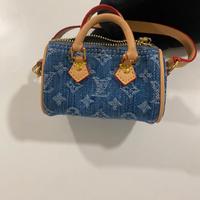 Louis Vuitton charme/ portamonete