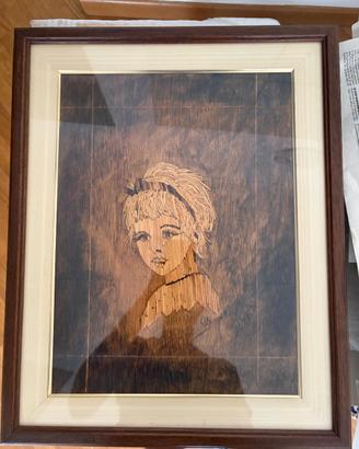 Ritratto femminile in intarsio di legno