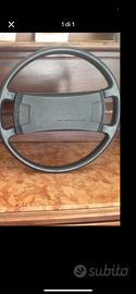 Volante e borsa attrezzi porsche