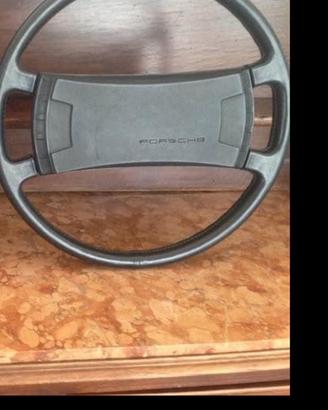 Volante e borsa attrezzi porsche