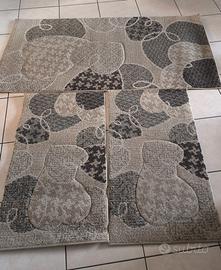 Tris di tappeti da camera 