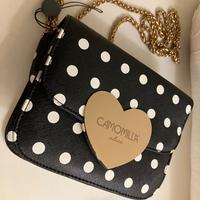 Piccola borsa a tracolla nera a pois “Camomilla”