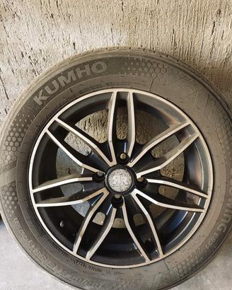 4 Gomme semi nuove con cerchi in lega,-ottime .