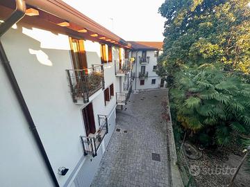 Elegante bicamere con travi a vista nel cuore d...
