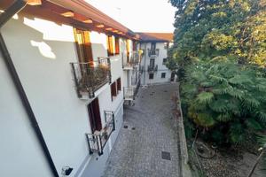 Elegante bicamere con travi a vista nel cuore d...