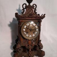 Orologio in bronzo patinato d' epoca 800.