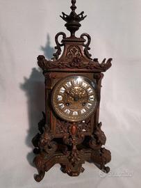 Orologio in bronzo patinato d' epoca 800.