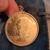 Medaglia commemorativa da 1 dollaro. Placcata oro