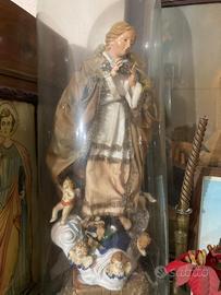 Campana con Santo