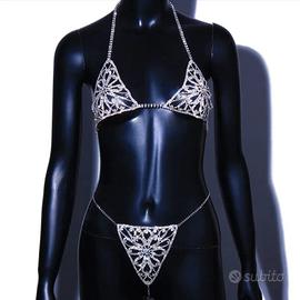 Completo a catenina colore argento, nuovo.