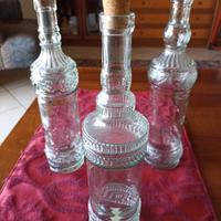 Bottiglie in vetro lavorato