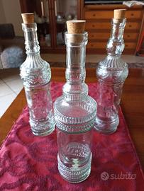 Bottiglie in vetro lavorato