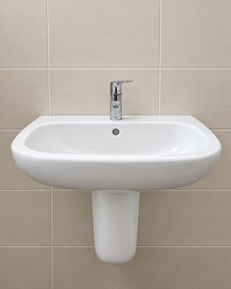 Lavandino con sifone e viti di fissaggio