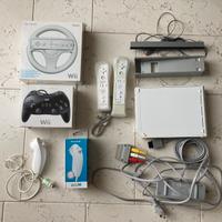 Console Wii + giochi + Wii fit plus