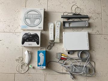 Console Wii + giochi + Wii fit plus