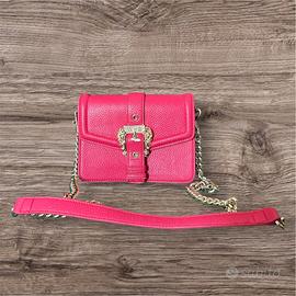 borsa Versace, jeans, culture