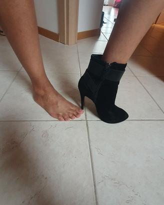 Scarpe guess alte con tacco.