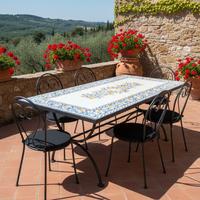 Tavolo in pietra lavica decorato a mano in Italia