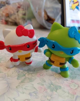 due personaggi Hello Kitty x Tartarughe Ninjia