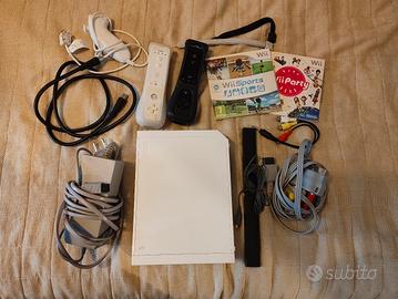 Nintendo Wii completa + 2 giochi + 2 telecomandi