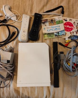 Nintendo Wii completa + 2 giochi + 2 telecomandi
