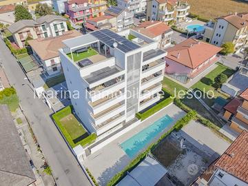 Elegante Appartamento Trilocale con Terrazza Panor