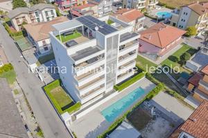 Elegante Appartamento Trilocale con Terrazza Panor