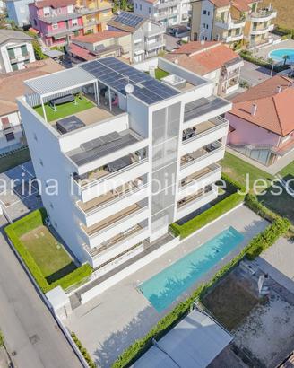 Elegante Appartamento Trilocale con Terrazza Panor