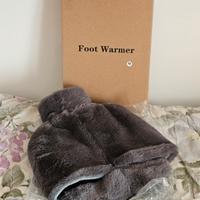 scaldapiedi con borsa d'acqua calda grigio