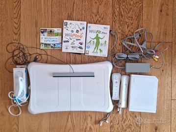 Consolle Wii + Balance Board e giochi