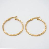 Orecchini a cerchio in oro giallo 18 kt A.6