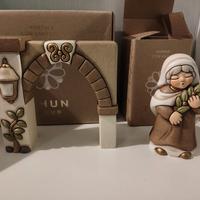 portale con ulivo +donna con ulivo thun