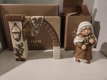 portale con ulivo +donna con ulivo thun