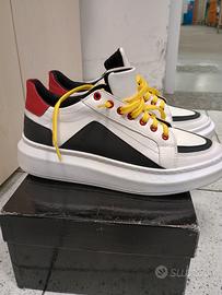 Sneakers artigianali da uomo