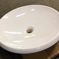 Lavabo da appoggio in ceramica bianca