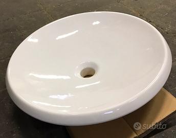 Lavabo da appoggio in ceramica bianca